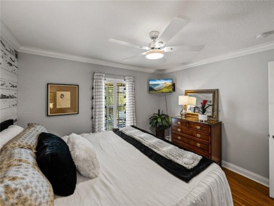 STUNNING CURB APPEAL on this GORGEOUS FULLY REMODELED PANORAMIC on Tampa Bay Golf and Country Club in Florida - for sale on GolfHomes.com, golf home, golf lot