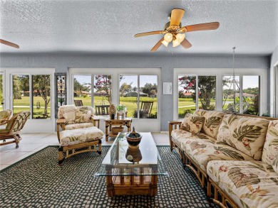 STUNNING CURB APPEAL on this GORGEOUS FULLY REMODELED PANORAMIC on Tampa Bay Golf and Country Club in Florida - for sale on GolfHomes.com, golf home, golf lot