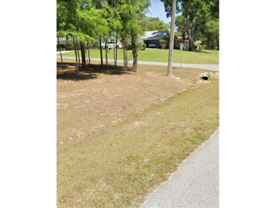 Check out this beautiful .23 acre corner lot in desirable on Rainbow Springs Golf and Country Club in Florida - for sale on GolfHomes.com, golf home, golf lot