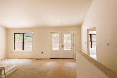Nestled on 0.6 wooded acres in Bryce Resort, 125 Crab Apple Rd on Bryce Resort Golf Course in Virginia - for sale on GolfHomes.com, golf home, golf lot