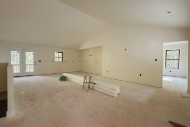 Nestled on 0.6 wooded acres in Bryce Resort, 125 Crab Apple Rd on Bryce Resort Golf Course in Virginia - for sale on GolfHomes.com, golf home, golf lot