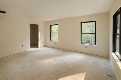 Nestled on 0.6 wooded acres in Bryce Resort, 125 Crab Apple Rd on Bryce Resort Golf Course in Virginia - for sale on GolfHomes.com, golf home, golf lot