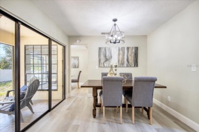 Beautifully renovated villa with private backyard view in Sutton on Highland Lakes Executive Golf Course in Florida - for sale on GolfHomes.com, golf home, golf lot