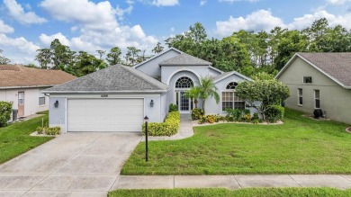 BEAUTIFUL 3 BEDROOM / 2 BATHROOM HOME ON CONSERVATION LOT IN on Timber Greens Country Club in Florida - for sale on GolfHomes.com, golf home, golf lot