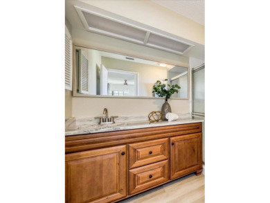 Beautifully renovated villa with private backyard view in Sutton on Highland Lakes Executive Golf Course in Florida - for sale on GolfHomes.com, golf home, golf lot