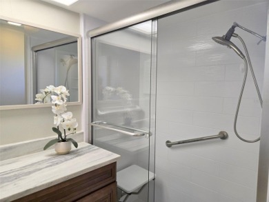Beautifully renovated villa with private backyard view in Sutton on Highland Lakes Executive Golf Course in Florida - for sale on GolfHomes.com, golf home, golf lot