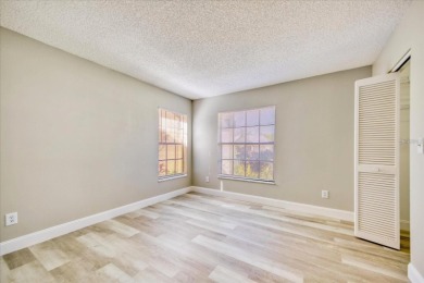 Beautifully renovated villa with private backyard view in Sutton on Highland Lakes Executive Golf Course in Florida - for sale on GolfHomes.com, golf home, golf lot