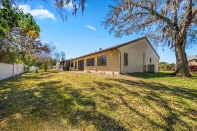Beautifully renovated villa with private backyard view in Sutton on Highland Lakes Executive Golf Course in Florida - for sale on GolfHomes.com, golf home, golf lot