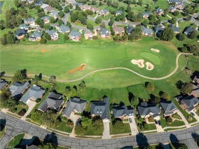 Nestled in the golf course community of Salem Glen Country Club on Salem Glen Country Club in North Carolina - for sale on GolfHomes.com, golf home, golf lot