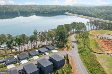 Experience refined lakeside living surrounded by the vibrant on The Highlands Course at Lake Arrowhead in Georgia - for sale on GolfHomes.com, golf home, golf lot