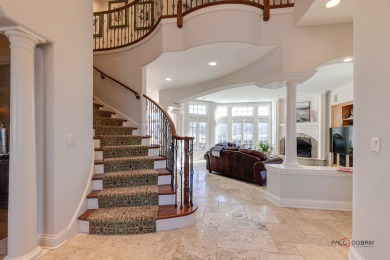 Discover luxury living in this stunning 4-bedroom, 4.2-bath home on Conway Farms Golf Club in Illinois - for sale on GolfHomes.com, golf home, golf lot