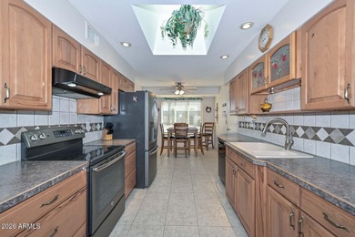 Welcome home to the highly desirable Sun City community! This 2 on Sun City Lakes West and East in Arizona - for sale on GolfHomes.com, golf home, golf lot