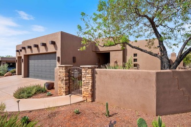 This elegant home sits on the Entrada Fairway with large windows on Entrada at Snow Canyon in Utah - for sale on GolfHomes.com, golf home, golf lot