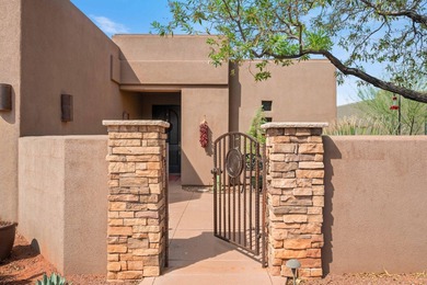 This elegant home sits on the Entrada Fairway with large windows on Entrada at Snow Canyon in Utah - for sale on GolfHomes.com, golf home, golf lot