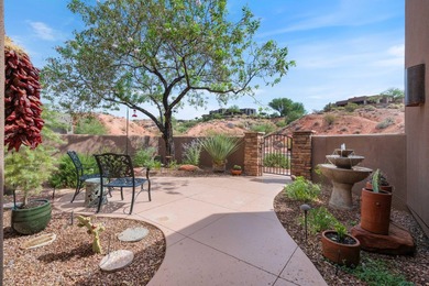This elegant home sits on the Entrada Fairway with large windows on Entrada at Snow Canyon in Utah - for sale on GolfHomes.com, golf home, golf lot