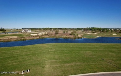 Homesite 42 is a wide flat lot offering breathtaking views of a on Occano Golf Course in North Carolina - for sale on GolfHomes.com, golf home, golf lot