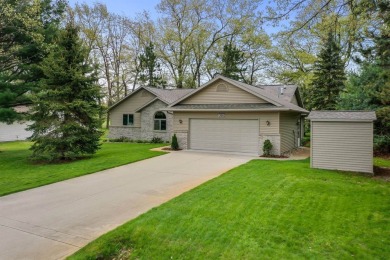 Nestled on the 9th hole of White Deer Country Club, this on White Deer Country Club in Michigan - for sale on GolfHomes.com, golf home, golf lot
