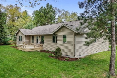 Nestled on the 9th hole of White Deer Country Club, this on White Deer Country Club in Michigan - for sale on GolfHomes.com, golf home, golf lot
