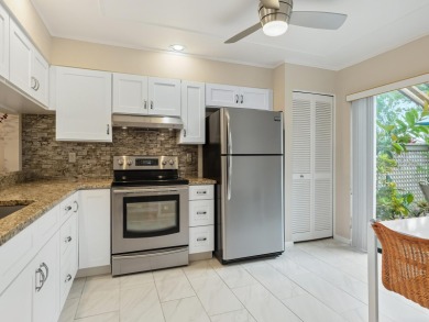 Looking for an updated END-UNIT that feels like home right away on The Meadows Golf and Country Club in Florida - for sale on GolfHomes.com, golf home, golf lot