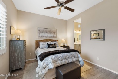 Step into this immaculately maintained 2-bedroom, 2-bathroom on Quail Wood Greens Golf Course in Arizona - for sale on GolfHomes.com, golf home, golf lot