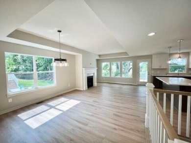 This beautiful and inviting open floor plan home on site # 2 on Angels Crossing Golf Club in Michigan - for sale on GolfHomes.com, golf home, golf lot