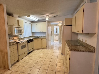 Start your next chapter in the gated Plantation at Leesburg on Plantation Golf Club in Florida - for sale on GolfHomes.com, golf home, golf lot