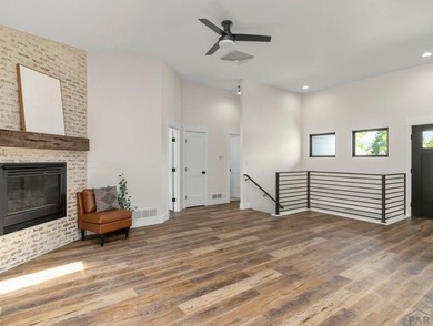 BACKING UP TH THE 11TH FAIRWAY OF DESERT HAWK GOLF COURSE THIS on Desert Hawk At Pueblo West in Colorado - for sale on GolfHomes.com, golf home, golf lot