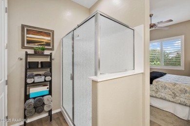 Step into this immaculately maintained 2-bedroom, 2-bathroom on Quail Wood Greens Golf Course in Arizona - for sale on GolfHomes.com, golf home, golf lot