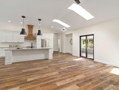 BACKING UP TH THE 11TH FAIRWAY OF DESERT HAWK GOLF COURSE THIS on Desert Hawk At Pueblo West in Colorado - for sale on GolfHomes.com, golf home, golf lot