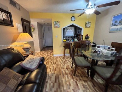 Immerse yourself in the carefree charm of this delightful 1-bed on Sunrise Country Club in Florida - for sale on GolfHomes.com, golf home, golf lot