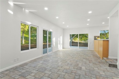 This one is special. Nestled on a peaceful, secluded lot in on Anaheim Hills Golf Course in California - for sale on GolfHomes.com, golf home, golf lot