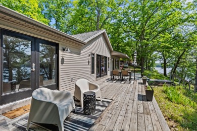 This beautiful Lake Mecosta property features 137 feet of nice on St. Ives Golf Club in Michigan - for sale on GolfHomes.com, golf home, golf lot