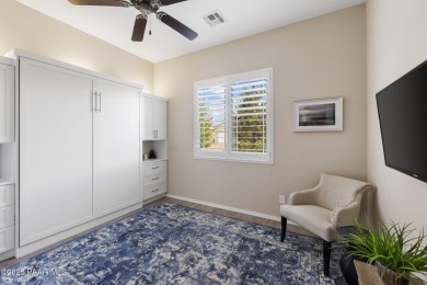 Step into this immaculately maintained 2-bedroom, 2-bathroom on Quail Wood Greens Golf Course in Arizona - for sale on GolfHomes.com, golf home, golf lot