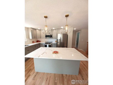 Location, views and updated finishes, this home has it all! on Sunset Golf Course in Colorado - for sale on GolfHomes.com, golf home, golf lot