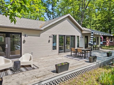 This beautiful Lake Mecosta property features 137 feet of nice on St. Ives Golf Club in Michigan - for sale on GolfHomes.com, golf home, golf lot