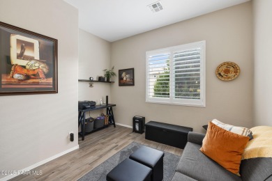 Step into this immaculately maintained 2-bedroom, 2-bathroom on Quail Wood Greens Golf Course in Arizona - for sale on GolfHomes.com, golf home, golf lot