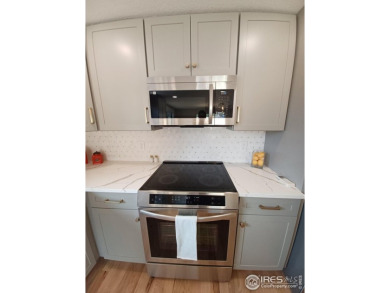 Location, views and updated finishes, this home has it all! on Sunset Golf Course in Colorado - for sale on GolfHomes.com, golf home, golf lot
