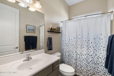 Step into this immaculately maintained 2-bedroom, 2-bathroom on Quail Wood Greens Golf Course in Arizona - for sale on GolfHomes.com, golf home, golf lot