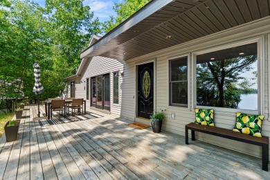 This beautiful Lake Mecosta property features 137 feet of nice on St. Ives Golf Club in Michigan - for sale on GolfHomes.com, golf home, golf lot