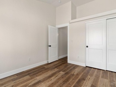 BACKING UP TH THE 11TH FAIRWAY OF DESERT HAWK GOLF COURSE THIS on Desert Hawk At Pueblo West in Colorado - for sale on GolfHomes.com, golf home, golf lot