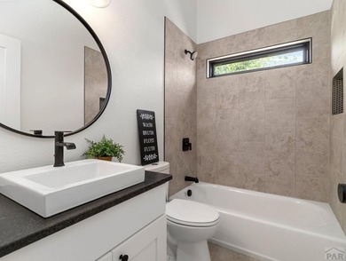 BACKING UP TH THE 11TH FAIRWAY OF DESERT HAWK GOLF COURSE THIS on Desert Hawk At Pueblo West in Colorado - for sale on GolfHomes.com, golf home, golf lot