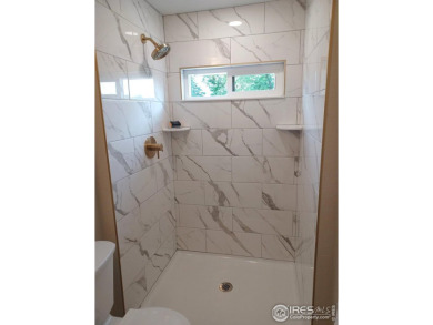 Location, views and updated finishes, this home has it all! on Sunset Golf Course in Colorado - for sale on GolfHomes.com, golf home, golf lot