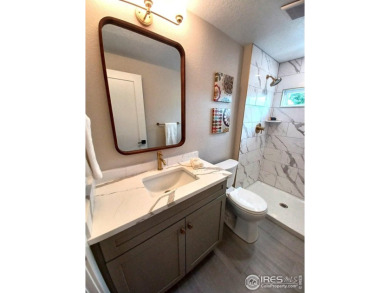 Location, views and updated finishes, this home has it all! on Sunset Golf Course in Colorado - for sale on GolfHomes.com, golf home, golf lot
