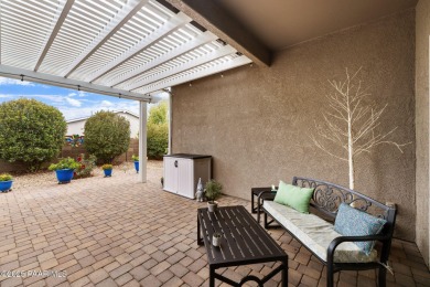 Step into this immaculately maintained 2-bedroom, 2-bathroom on Quail Wood Greens Golf Course in Arizona - for sale on GolfHomes.com, golf home, golf lot