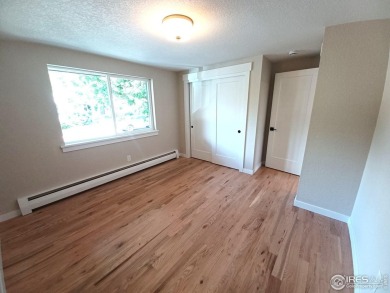 Location, views and updated finishes, this home has it all! on Sunset Golf Course in Colorado - for sale on GolfHomes.com, golf home, golf lot