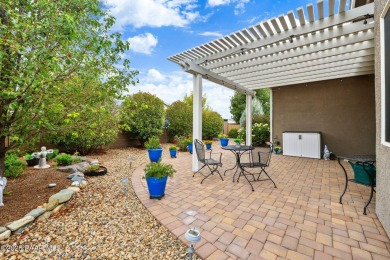 Step into this immaculately maintained 2-bedroom, 2-bathroom on Quail Wood Greens Golf Course in Arizona - for sale on GolfHomes.com, golf home, golf lot