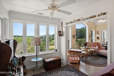 Gorgeous custom built home with enchanting marsh views. Walk to on Ocean Creek Golf Course in South Carolina - for sale on GolfHomes.com, golf home, golf lot