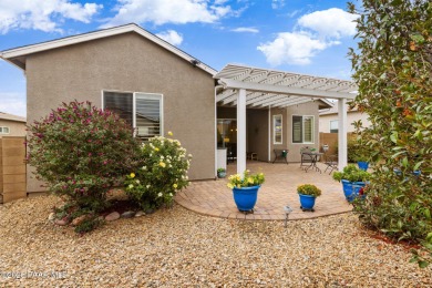 Step into this immaculately maintained 2-bedroom, 2-bathroom on Quail Wood Greens Golf Course in Arizona - for sale on GolfHomes.com, golf home, golf lot