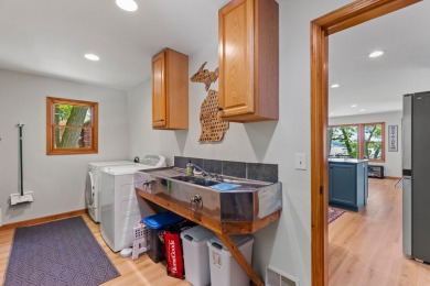 This beautiful Lake Mecosta property features 137 feet of nice on St. Ives Golf Club in Michigan - for sale on GolfHomes.com, golf home, golf lot