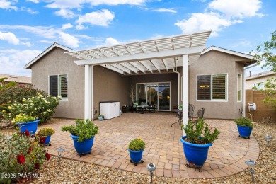 Step into this immaculately maintained 2-bedroom, 2-bathroom on Quail Wood Greens Golf Course in Arizona - for sale on GolfHomes.com, golf home, golf lot